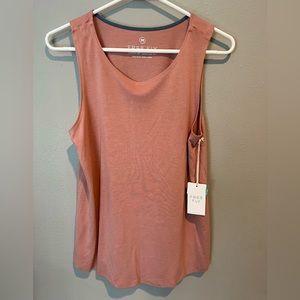Women’s Free Fly Bamboo Highline Tank size medium in orange dusk.